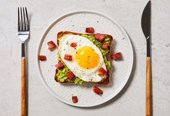 Avocado Toast with Egg and Crispy Pancetta on Country Grain - 850 x 630