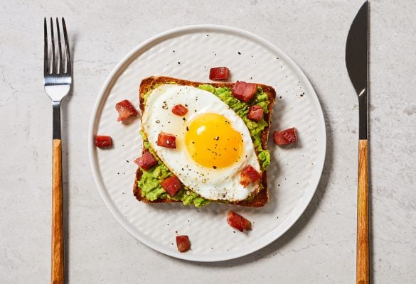 Avocado Toast with Egg and Crispy Pancetta on Country Grain - 850 x 630