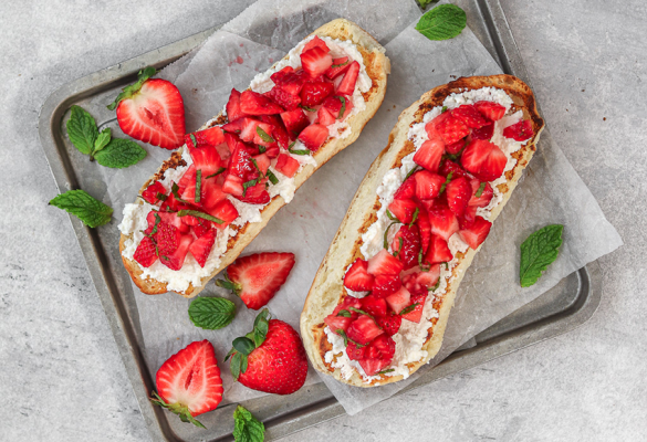 Strawberry bruschetta on parchment paper