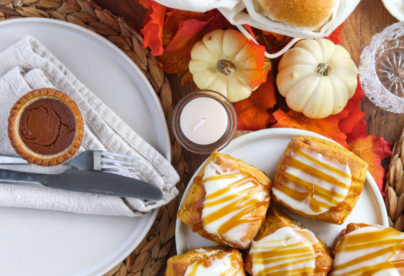Pumpkin theme, pumpkin tarts and pumpkin scones on table