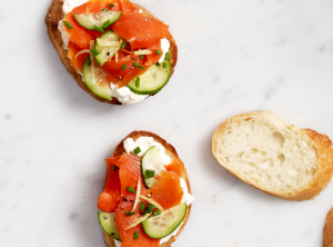 Smoked Salmon, Cream Cheese, and Cucumber Crostini on bread