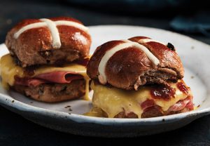 hot cross bun small sandwiches with brie, prosciutto, fig, chutney